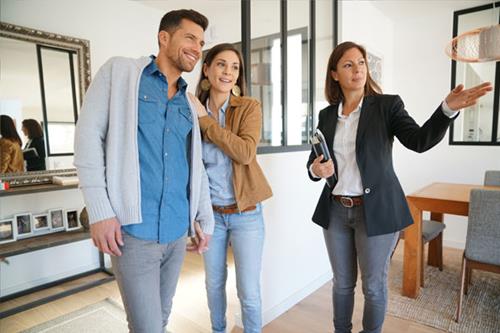 Couple With Real Estate Agent